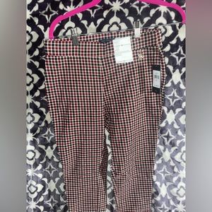 Brand new never worn tommy jeans with cute title charm on the waist band